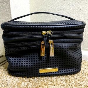 Tartan + Twine train makeup bag